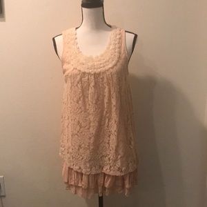 Peach colored tunic. Size M